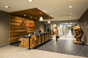 Corporate welcome desk featuring lots of wooden beam work