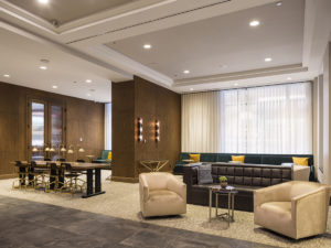 Hotel lounge with dark wood and luxurious seating