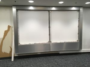 large frame display with metal surrounding