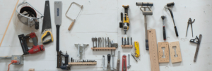 image of woodworking tools hanging on a wall